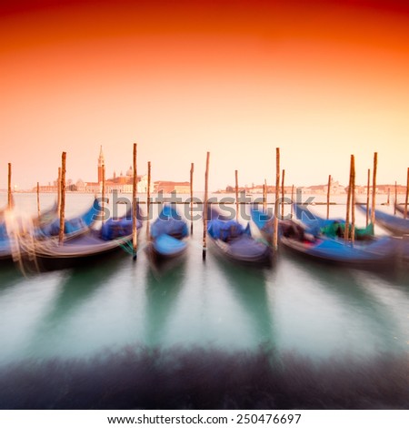 beautiful Venice, Italy with gondolas -colored photo, with added vignetting, long exposure