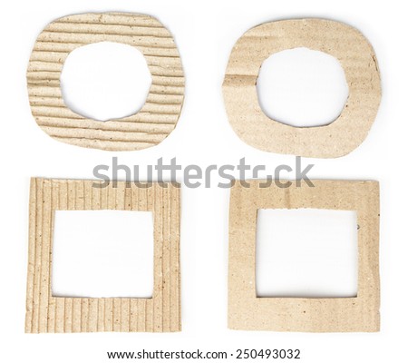 Old brown cardboard frame set isolated on white