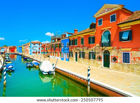 Venice landmark, Burano island canal, colorful houses and boats, Italy. Long exposure photography