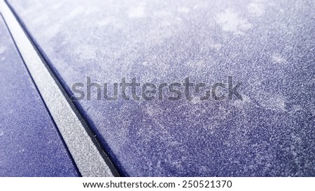 roof of a car in the frost with a rain chanel to the left