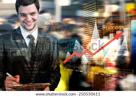 Double exposure of businessman working with computer graph and business strategy as concept,motion blur