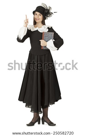 Young woman with a book in the role of Mary Poppins   Royalty-Free Stock Photo #250582720