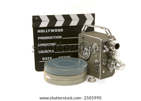 movie camera reels and a clapboard