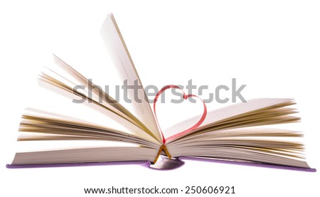 beautiful romantic red paper tape shape as heart, in a new small poetry book isolated on white background - pictures concept theme Love, St. Valentine's Day, and education