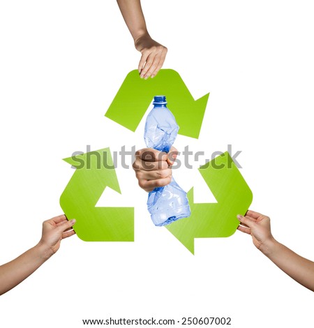 Plastic and pet recycling- studio shot of a squeezed plastic bottle isolated on white background