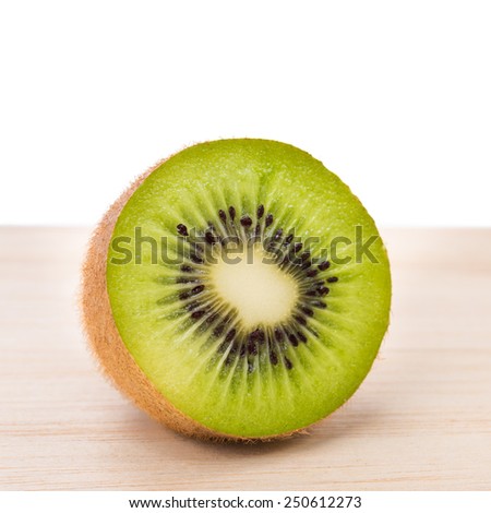 kiwi fruit on wooden table