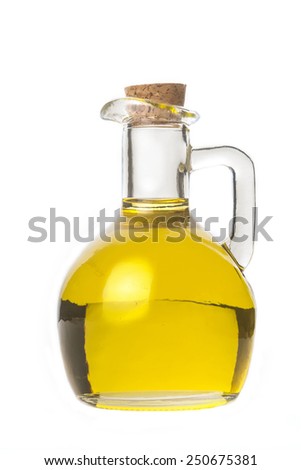 Extra virgin olive oil, a glass with olive oil isolated on white background Royalty-Free Stock Photo #250675381