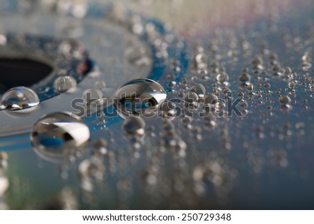 Water droplets on CD. Macro abstraction