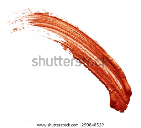Strokes of bronze paint isolated on white background