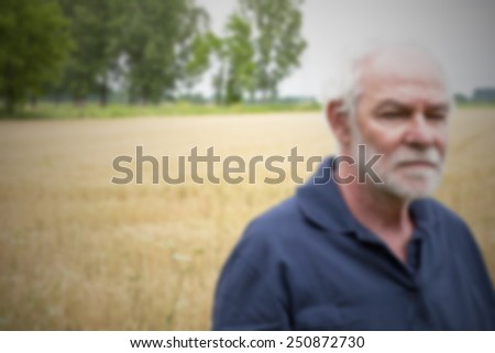 Man in the corn field. Intentionally blurred editing post production.