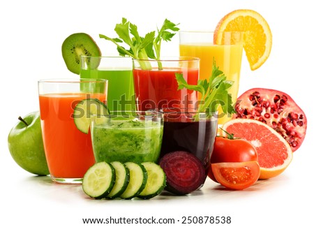 Glasses with fresh organic vegetable and fruit juices isolated on white. Detox diet. Royalty-Free Stock Photo #250878538