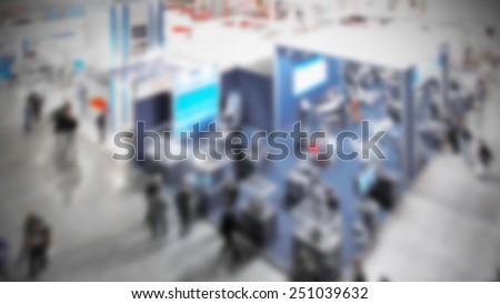 Trade show, panoramic view, generic background. Intentionally blurred editing post production.