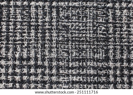 Background from a textile material. Wool fabric texture.