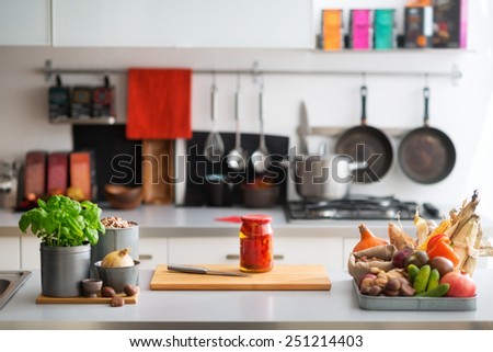 Closeup on table with vegetables in kitchen Royalty-Free Stock Photo #251214403