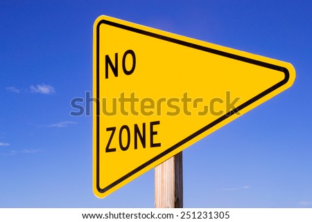 The yellow street sign with "No" and "Zone" and open space for text between.