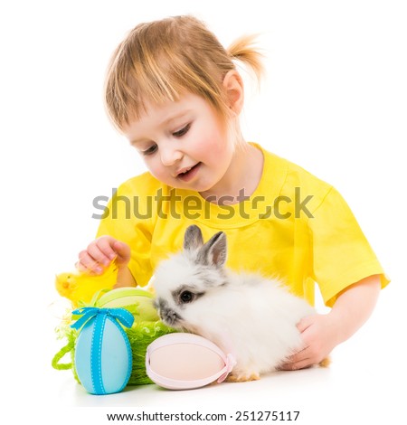 Easter photo. Cute little girl with a rabbit isolated on white background