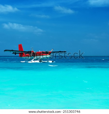 Twin otter red seaplane at Maldives