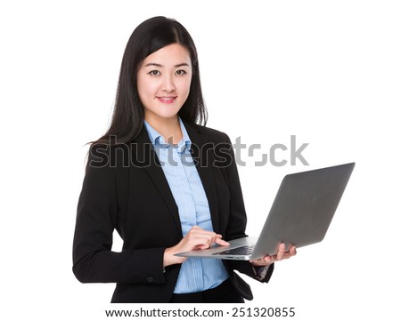 Businesswoman use of notebook computer