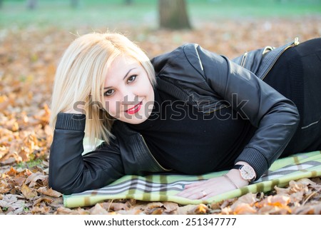 Young cute girl on walk in park