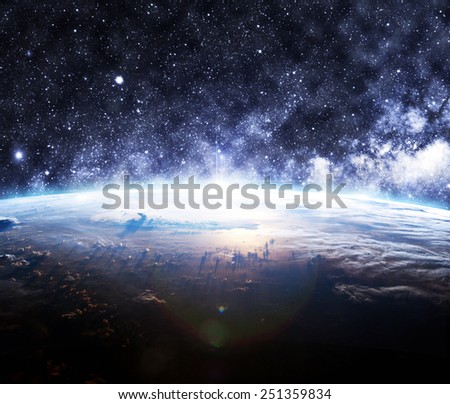 The Earth Below a Starry Sky - Elements of this Image Furnished by NASA