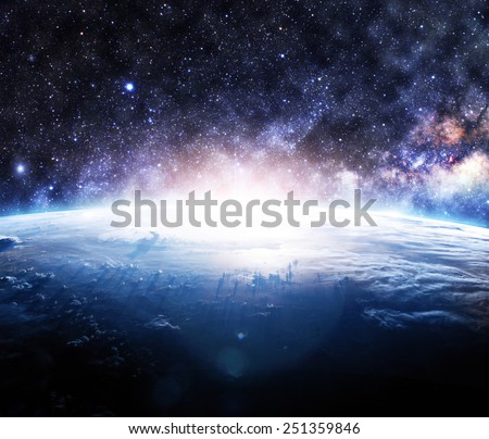 Glowing Sunrise Over Earth - Elements of this Image Furnished by NASA
