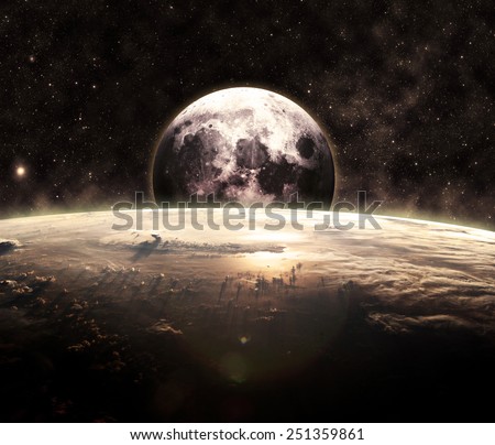 Golden Sunrise and the Moon - Elements of this Image Furnished by NASA