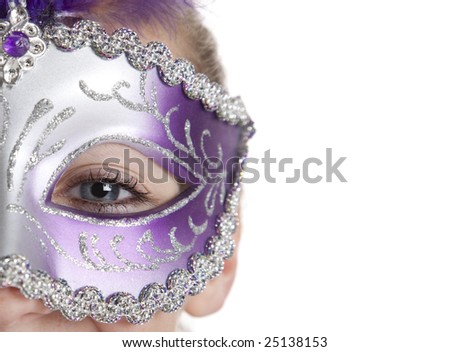 A girl in a Halloween or Mardi Gras mask on a white background