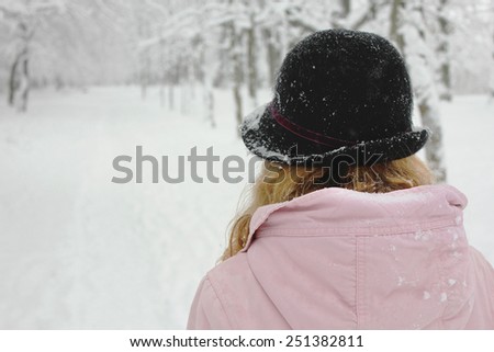 young woman in a park in winter