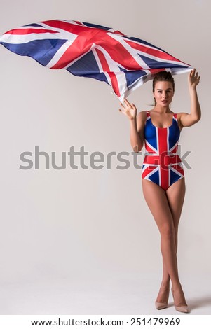 Beautiful Girl in swimsuit with Brazilian Flag