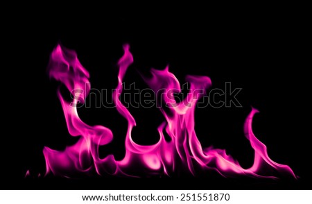 Pink fire and flames on black background