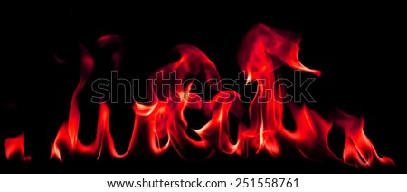 Fire and flames red on a black background