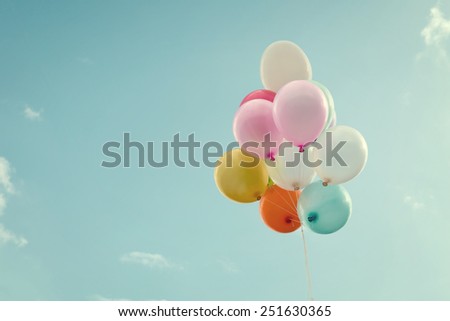 vintage heart balloon with colorful on blue sky concept of love in summer and valentine, wedding honeymoon 