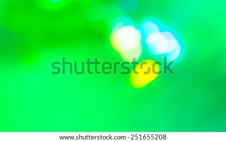 image of green , blue and yellow background with bokeh .