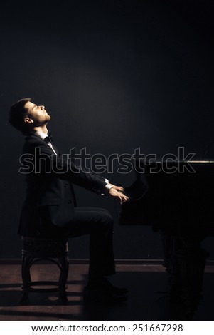 Piano classical music musician player. Pianist with musical instrument grand piano