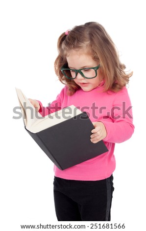 Adorable little girl reading a book isolated on a white background