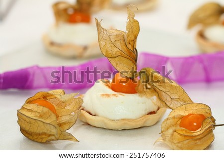 still life by St. Valentine's Day: tartlets with apple filling and a lemon meringue
