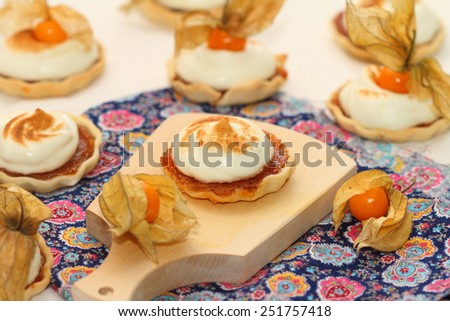still life by St. Valentine's Day: tartlets with apple filling and a lemon meringue 