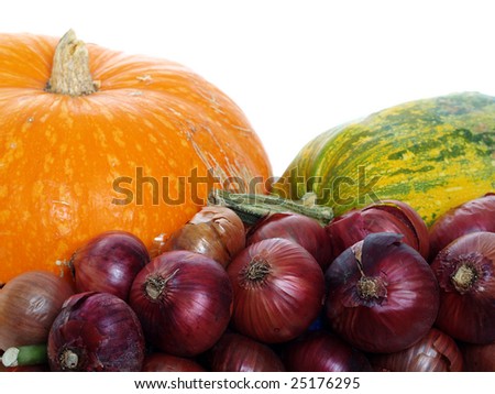 Orange pumpkins, marrow and lilac onion isolated on white