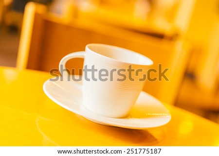 Coffee cup in cafe shop - vintage effect style pictures