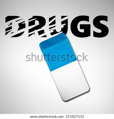 Eraser erasing the word DRUGS on a white background