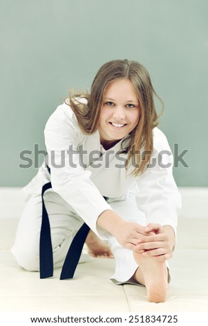 young, beautiful and successful women in karate martial positions