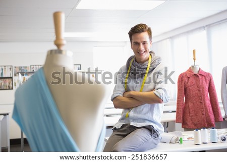 Fashion student sitting with arms crossed at the college