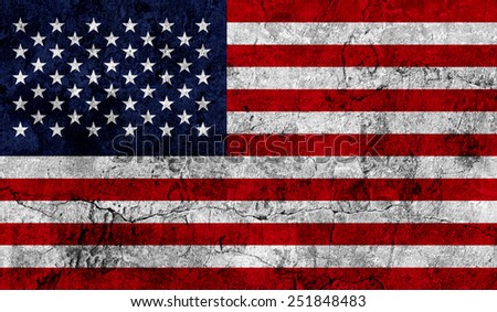 American national flag on an old worn weathered wall texture