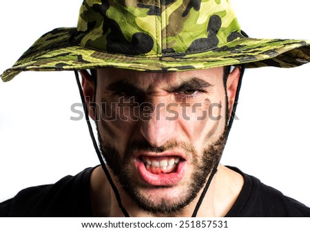 Closeup portrait of an angry soldier