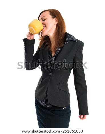 Business woman holding a cup of coffee 