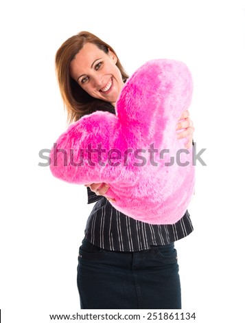 Business woman with heart toy