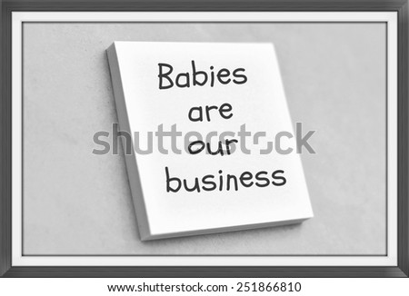 Vintage style text babies are our business on the short note texture background
