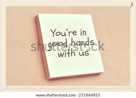 Text you are in good hands with us on the short note texture background