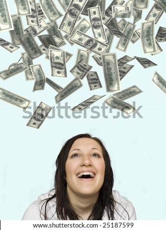 hundred dollar bills raining on laughing woman