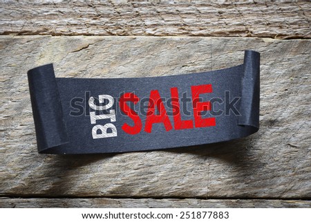 Papper with big sale. Black papper with big sale on wooden background